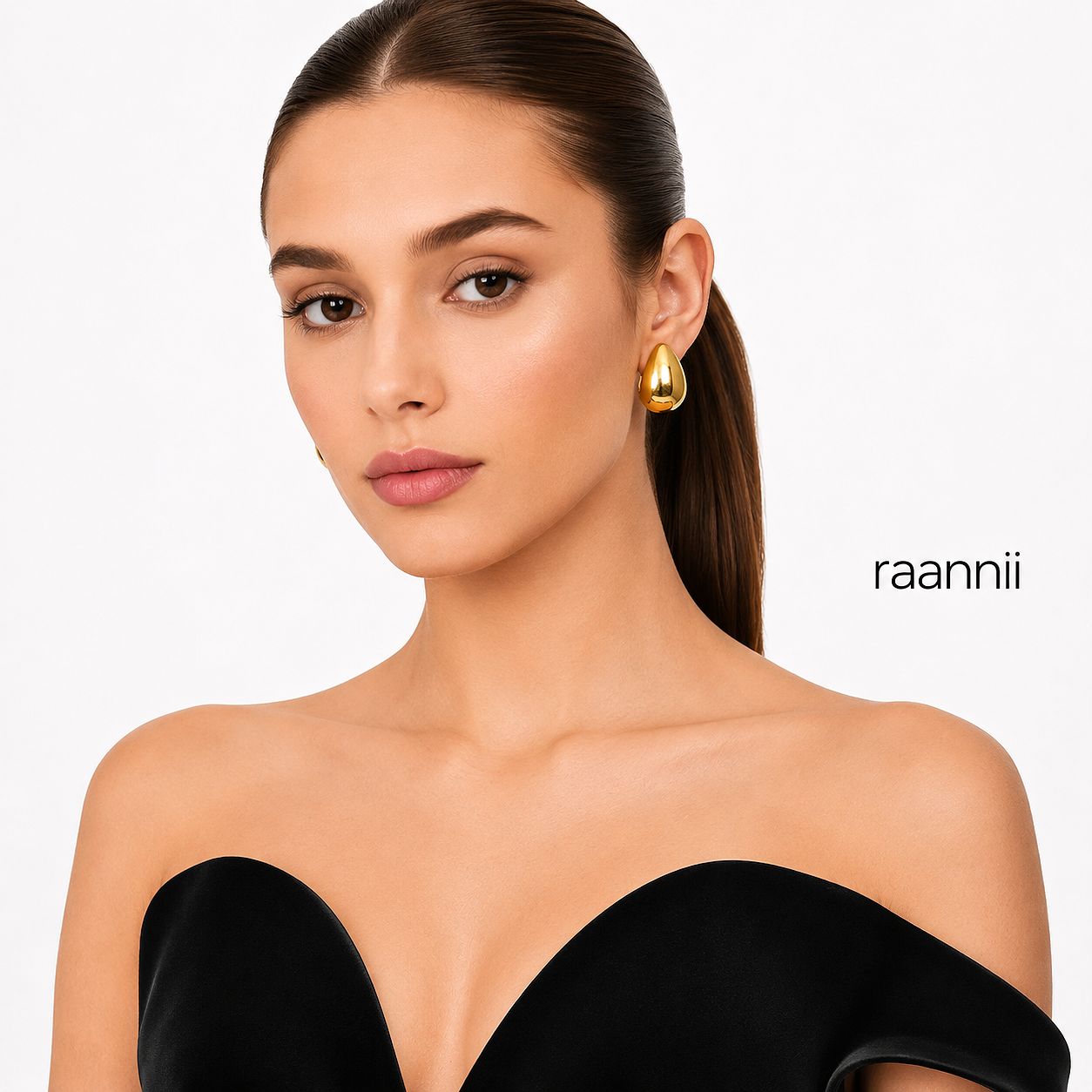 Raannii Gold Teardrop Statement Stud Earrings