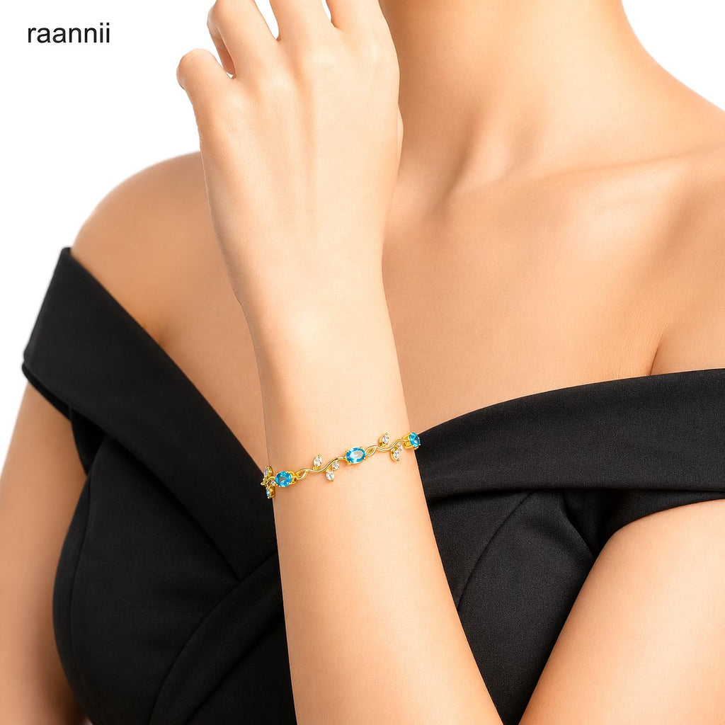 Raannii Blue Crystal Leaf Vine Gold-Plated Bracelet with Sparkling Crystal Stones for Women & Girls