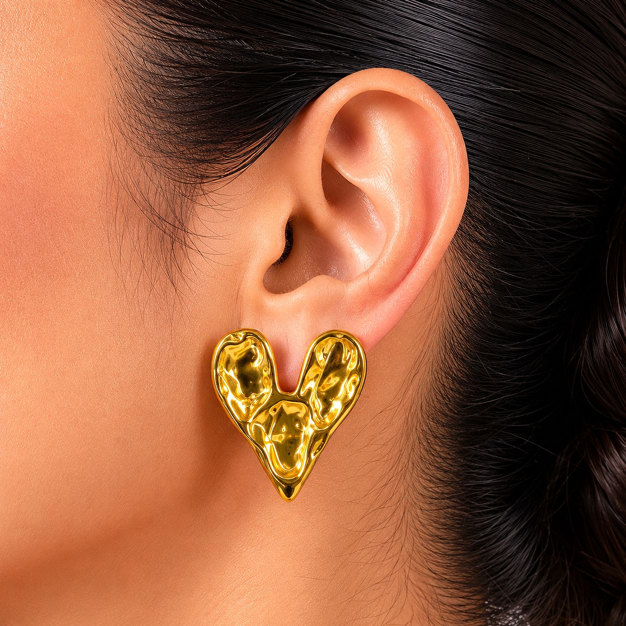 Raannii Sculpted Gold Heart Statement Earrings