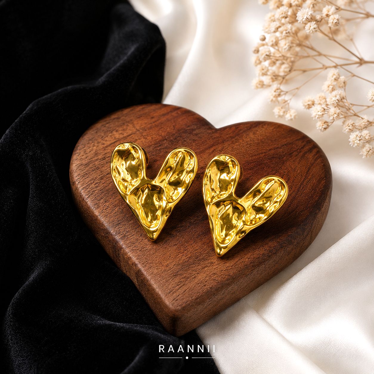 Raannii Sculpted Gold Heart Statement Earrings